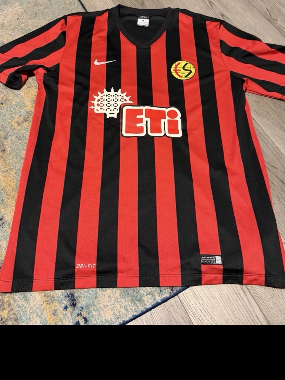 Nike Red and Black Striped Soccer Jersey with ETI Logo